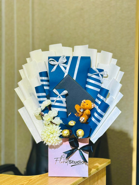 Blue Love Basket with Ferrero Rocher, Snickers, KitKat, cookies, and teddy bear