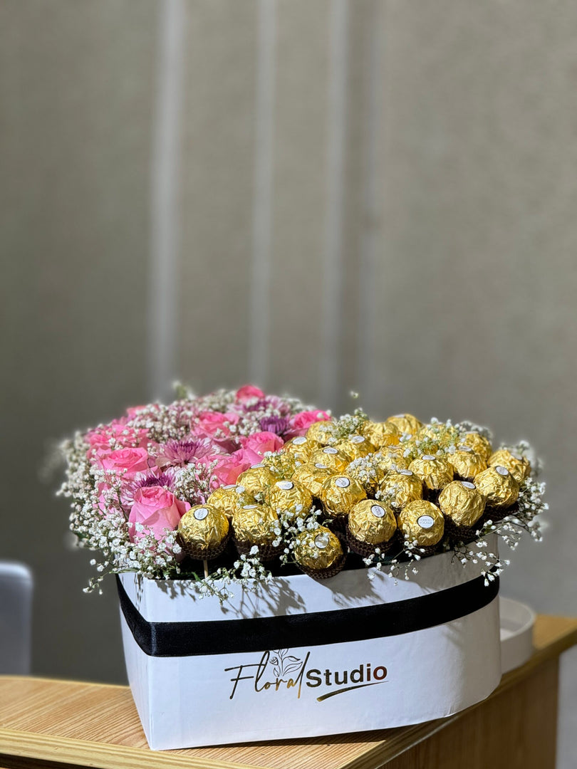 Heartfelt Affection bouquet with 12 pink roses and 16 Ferrero Rocher chocolates