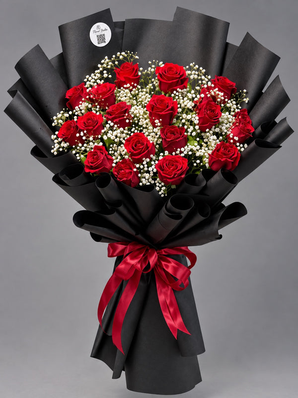 Love Noir red rose bouquet with baby's breath in black wrap