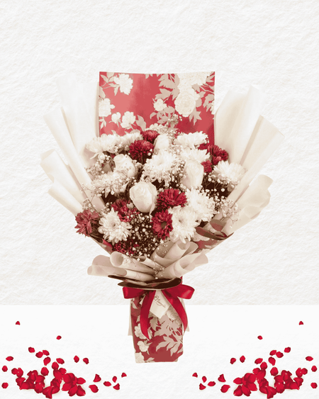 Bouquet of flowers with a red and white patterned paper wrap on a light gray background.