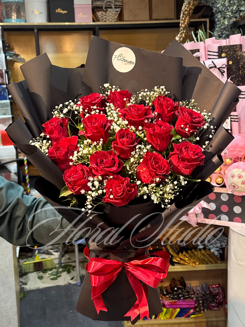 Red Symphony Bouquet with Red Roses and Babys Breath Free Delivery in Wapda Town Lahore