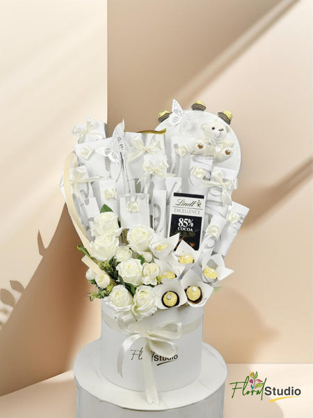 Whispers Of White hamper with Ferrero Rocher, chocolates, teddy bear, artificial flowers — delivery in Lahore, Karachi, Islamabad