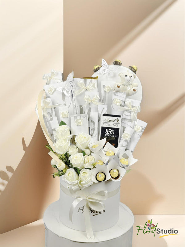 Whispers Of White hamper with Ferrero Rocher, chocolates, teddy bear, artificial flowers — delivery in Lahore, Karachi, Islamabad