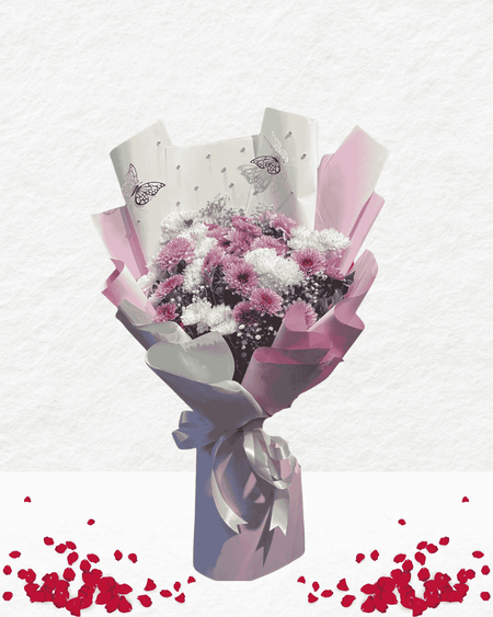 Bouquet of flowers wrapped in pink and white paper with butterfly designs on a light gray background.