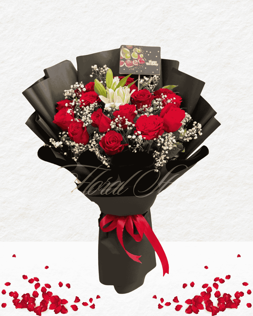 Bouquet of red roses with a black wrap and red ribbon on a light gray background.