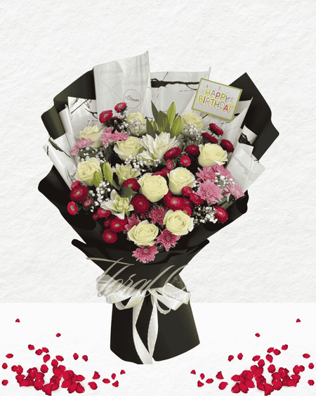 Bouquet of flowers with a 'Happy Birthday' card on a white background