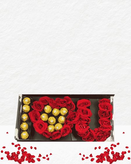 Gift set with red roses and gold chocolates shaped like 'I love you' on a white background