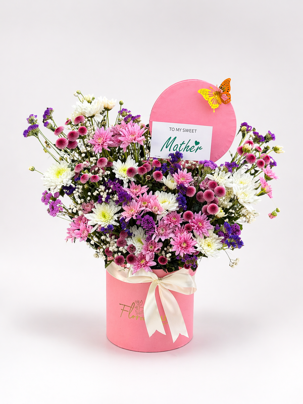 Mom Garden pastel flower box with a butterfly accent