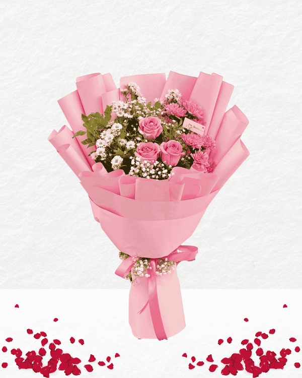 Bouquet of pink roses wrapped in pink paper with red heart-shaped petals on a light gray background