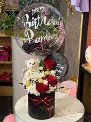 Red & White Treats gift basket with chocolates, cookies, and snacks

