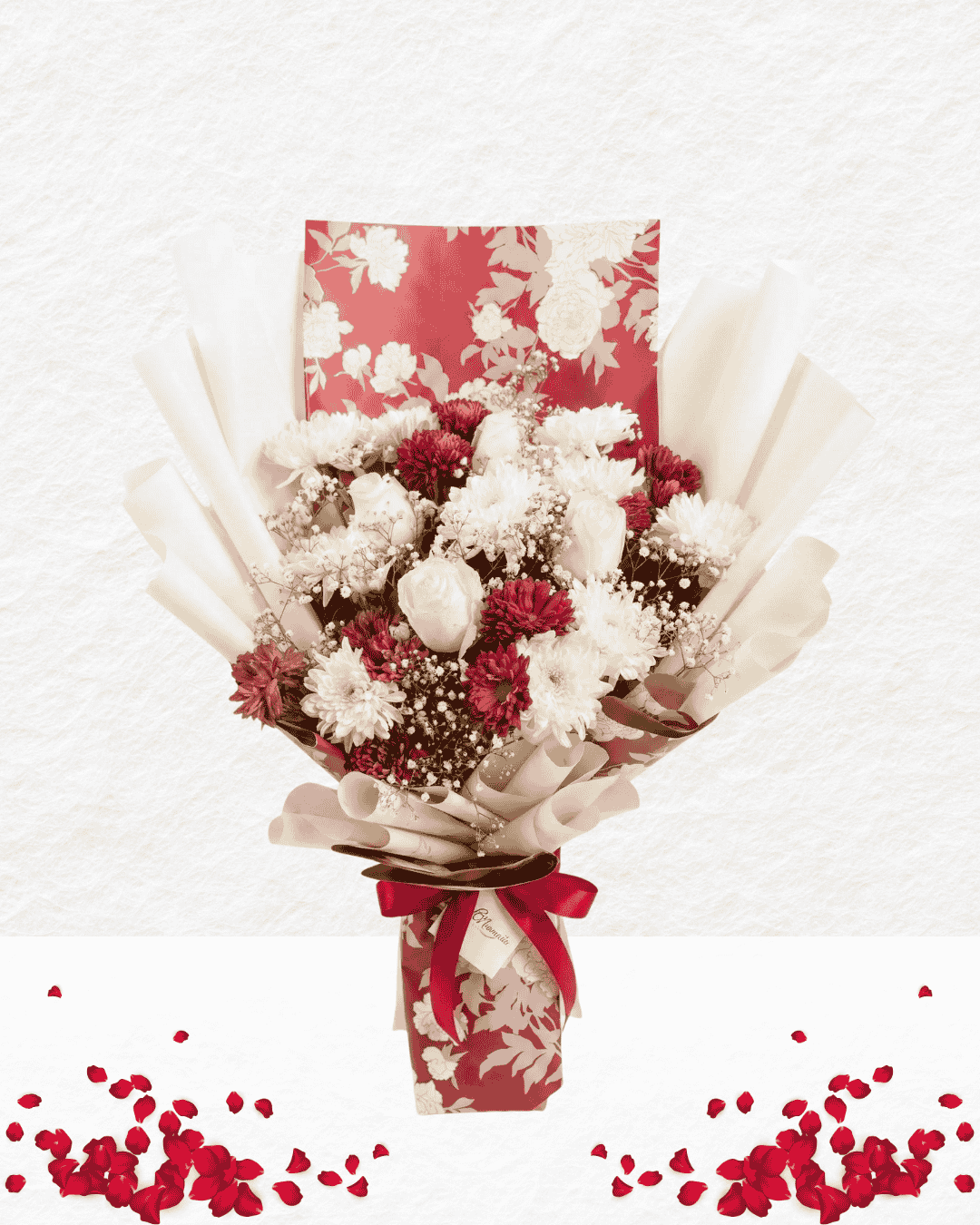 Bouquet of flowers with a red and white patterned paper wrap on a light gray background.
