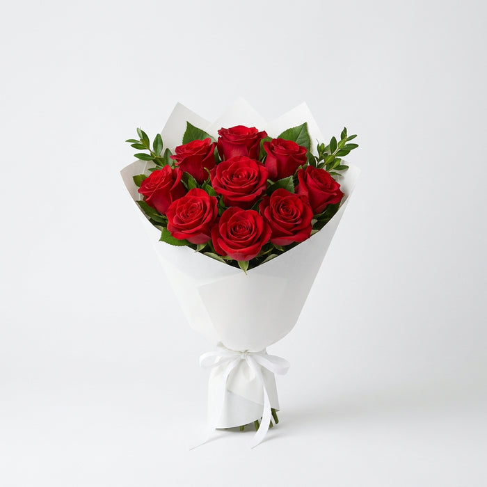Bouquet of red roses in a black outline on a white background