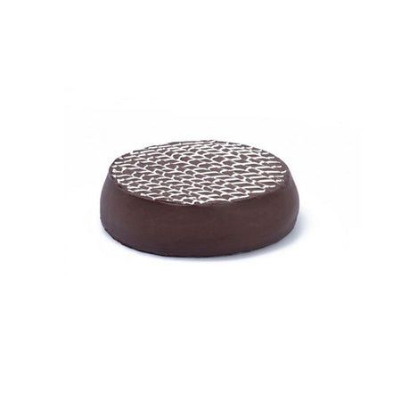 Piece of chocolate cheesecake with geometric pattern on top