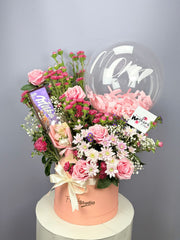 Gift Basket with Roses Chrysanthemums Balloon Chocolate and Gift Item in Pink Container Free Delivery in Model Town Lahore