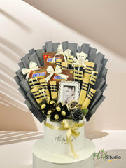 Golden Grace Delight hamper with Ferrero Rocher, chocolates, teddy bear, artificial flowers — delivery in Lahore, Karachi, Islamabad