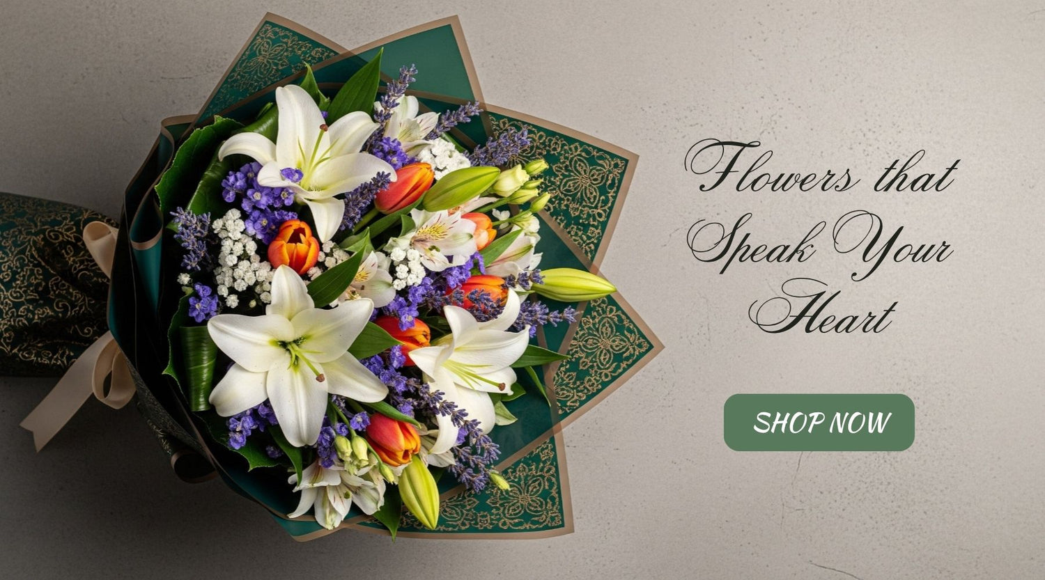 Bouquet of flowers with decorative box on a gray background, featuring text 'Flowers that Speak Your Heart' and 'Shop Now' button.
