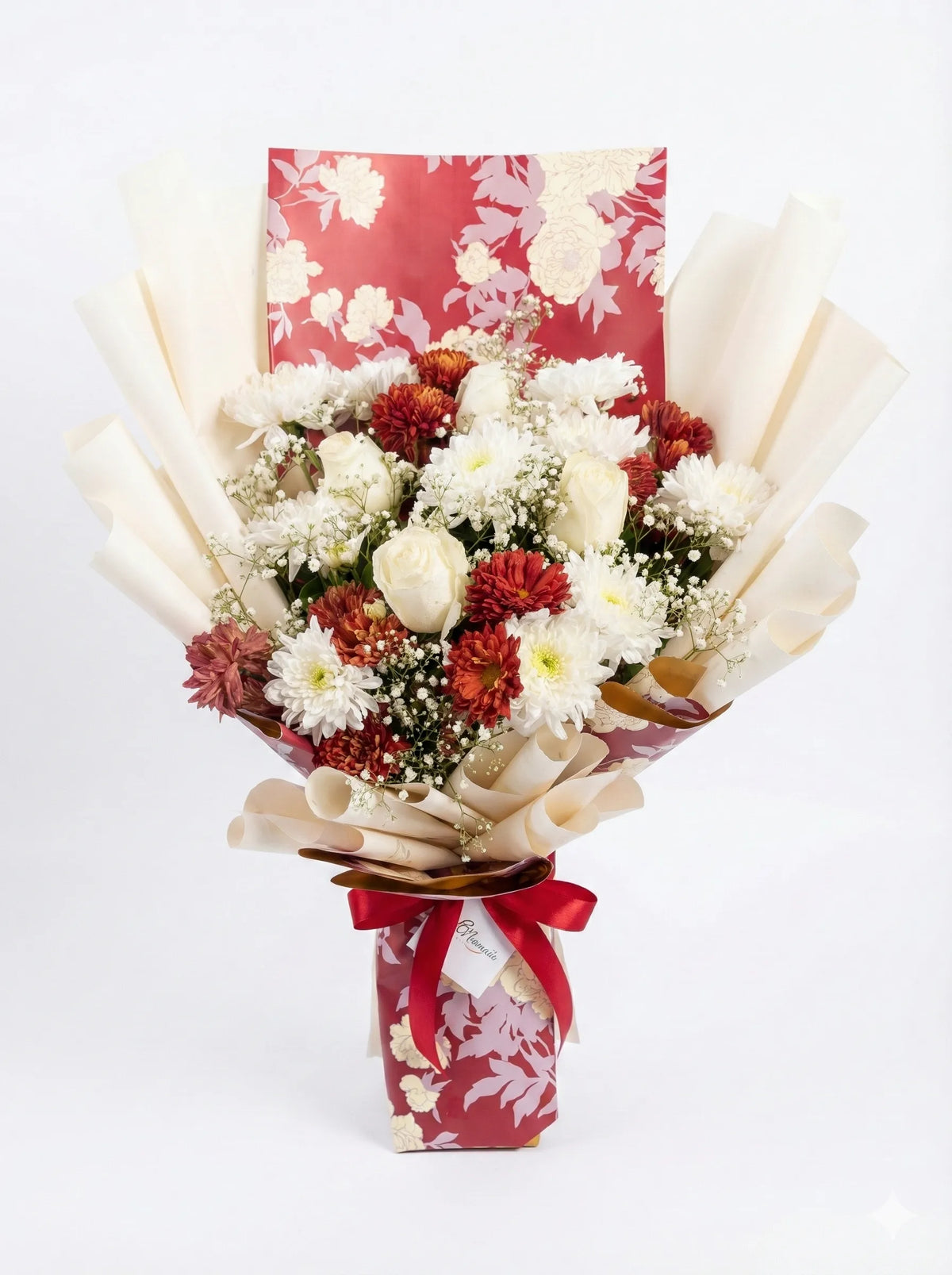 Bouquet of flowers wrapped in paper with a red ribbon on a white background
