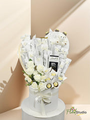 Whispers Of White hamper with Ferrero Rocher, chocolates, teddy bear, artificial flowers — delivery in Lahore, Karachi, Islamabad

