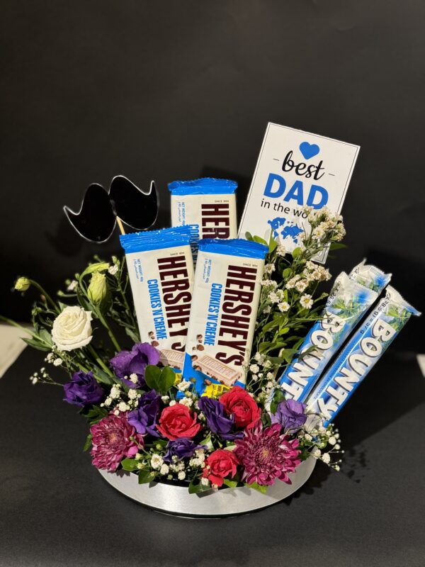 Beautiful Best Dad Bouquet and Gift Basket filled with gourmet treats and fresh flowers, perfect for Father's Day